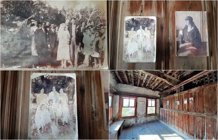Kayaköy (Levissi)’deki tarihi bir evin iç duvarlarına asılmış eski siyah-beyaz aile fotoğrafları ve ahşap tavanlı oda görünümü.